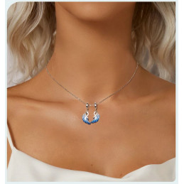 Deux charms pour bracelet ailes d'ange plume bleues
