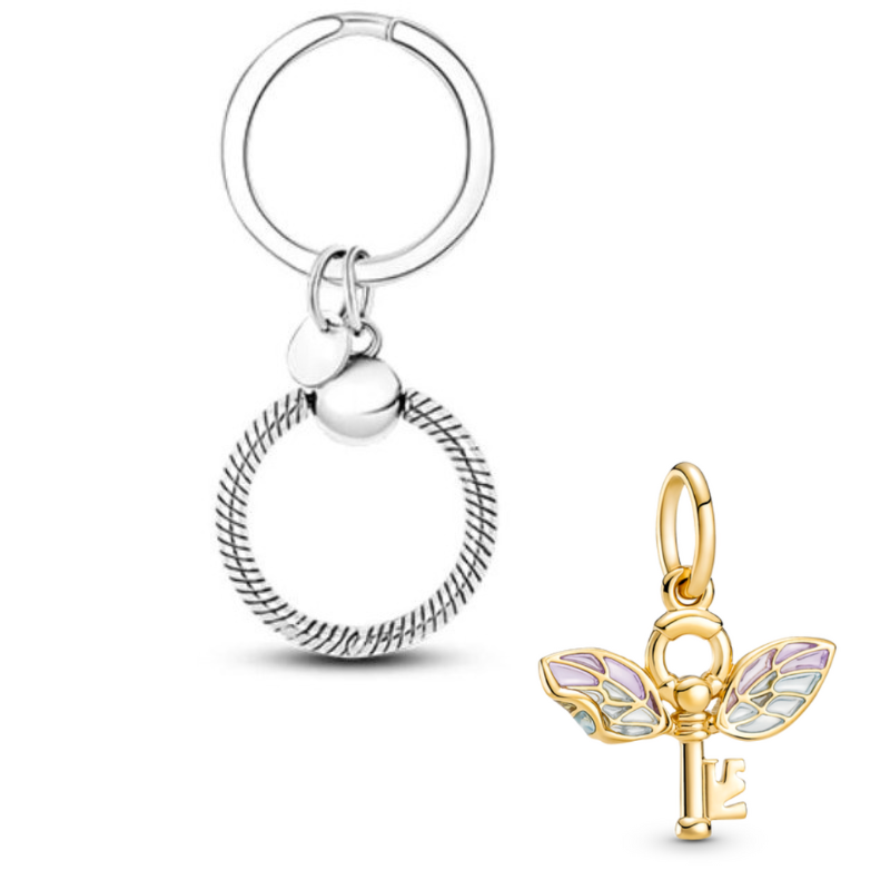 Porte clé avec bijou charm clef ailé Porte clé avec bijou charm clef ailé