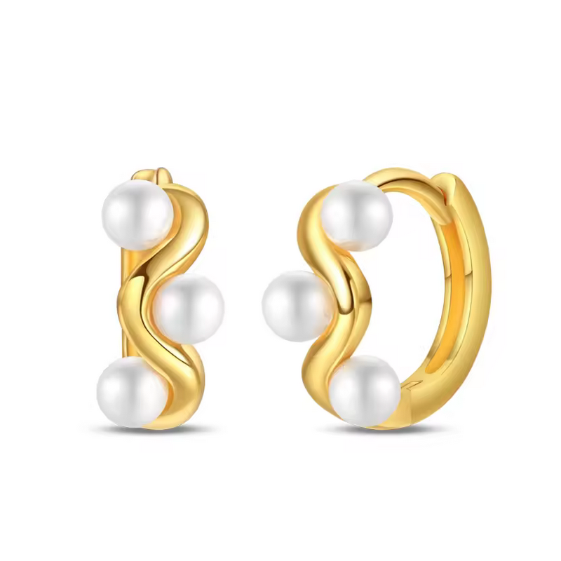 boucles d'oreilles courbe d'or et perle blanche boucles d'oreilles courbe d'or et perle blanche