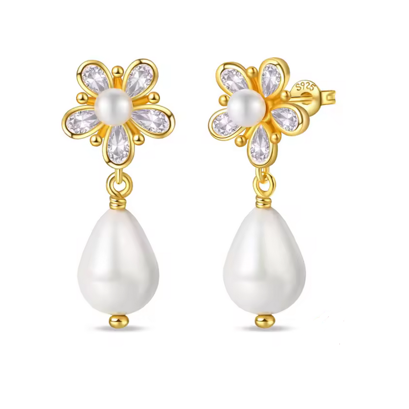 boucles d'oreilles or perle et grande fleur diamant boucles d'oreilles or perle et grande fleur diamant