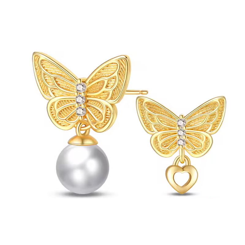 boucles d'oreilles papillon or perle blanche et coeur boucles d'oreilles papillon or perle blanche et coeur