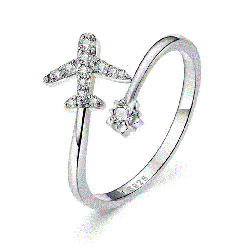 Bague réglable design avion strass fleur Bague réglable design avion strass fleur